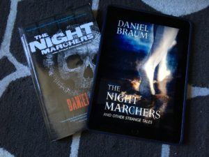 Physical edition of Dan Braum's The Night Marchers along with ebook on an iPad